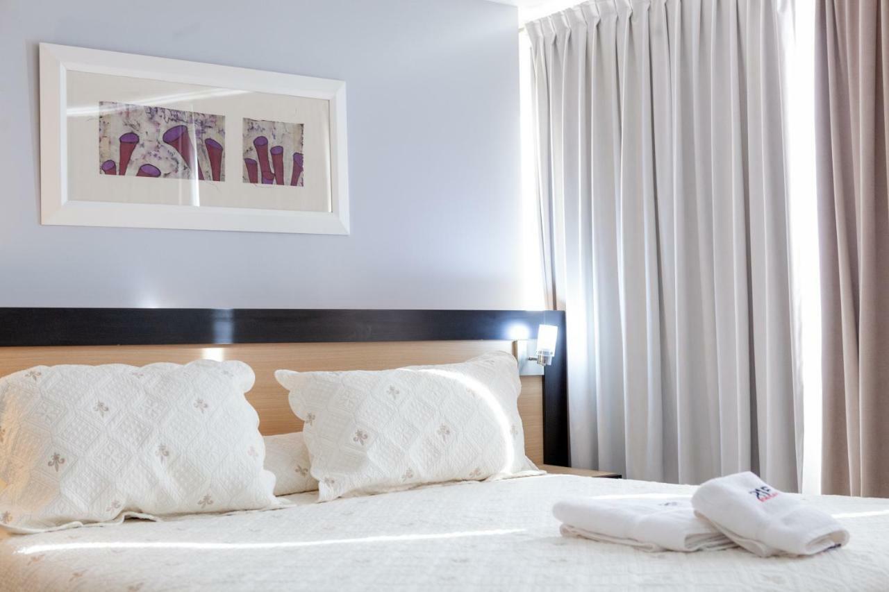 Apart Hotel Rivadavia 815 เนวเก็น ภายนอก รูปภาพ